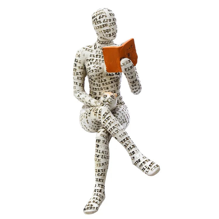 Statue de femme qui lit